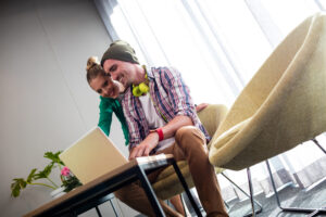 Businessmen using a computer in office