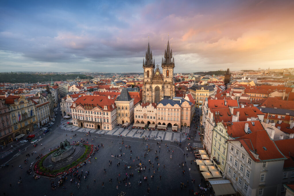 Aerial view of Old Town Square with Tyn Church at sunset - Prague, Czech Republic