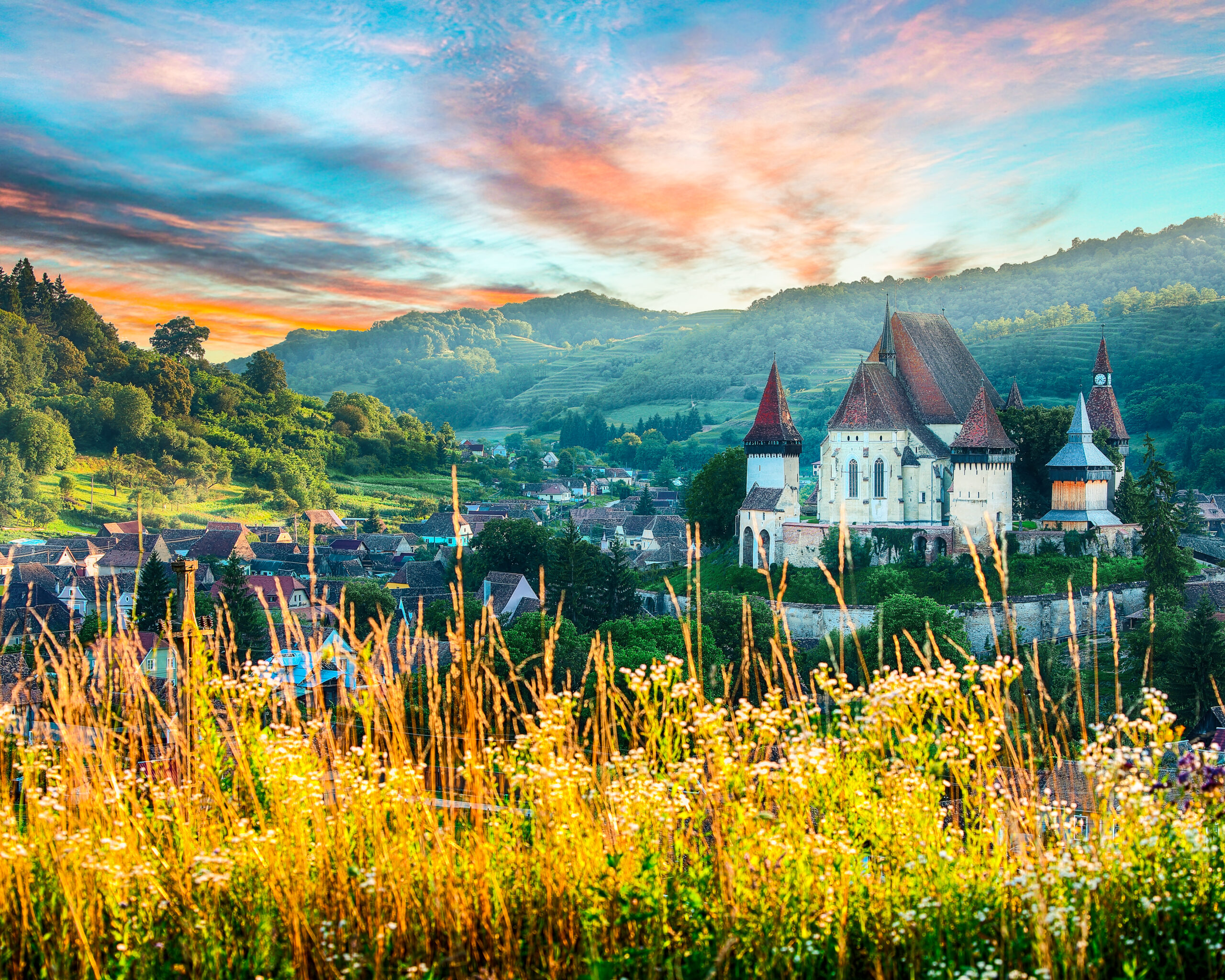 Beautiful medieval architecture of Biertan fortified Saxon church in Romania protected by Unesco World Heritage Site. Amazing sunset in Biertan.Transylvania, Sibiu, Biertan, Romania, Europe.