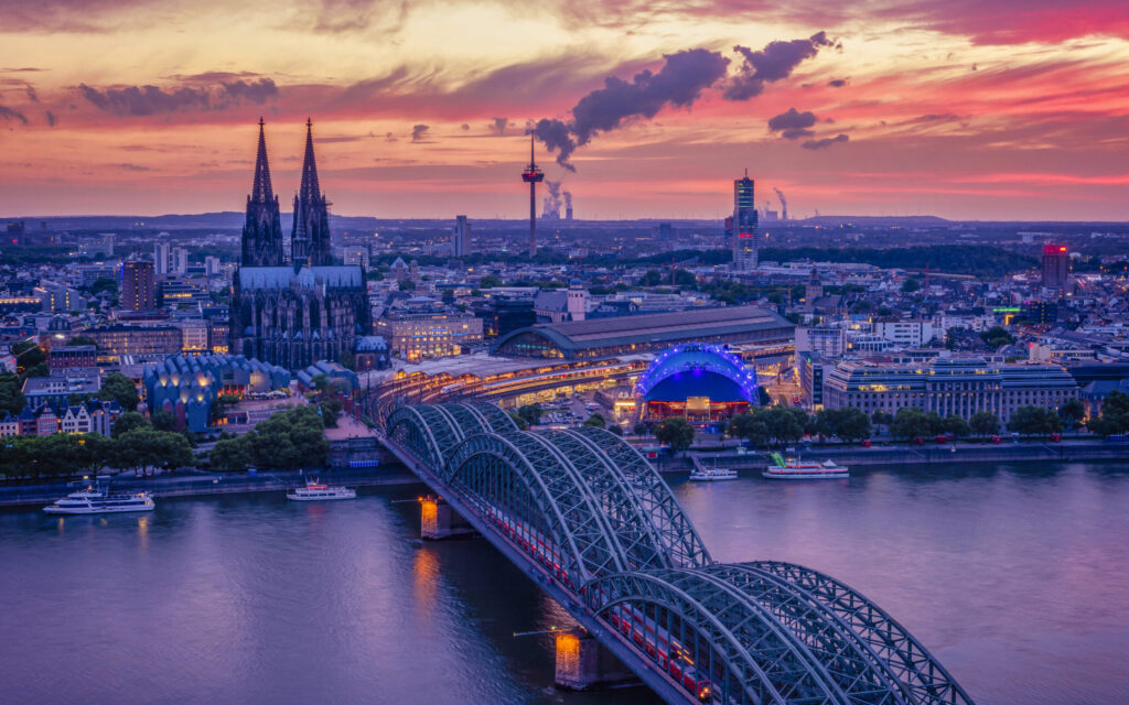 Cologne Koln Germany during sunset, Cologne bridge with the cathedral. beautiful sunset at the Rhine river
