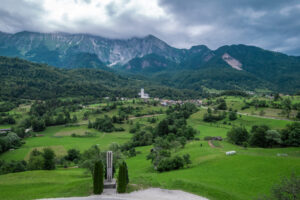 Drežnica village, Slovenia. Drone aerial view. Picturesque rural green landscape
