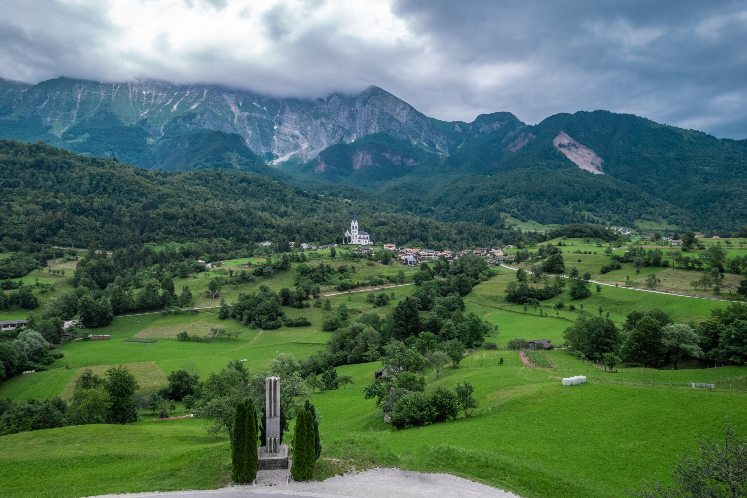 Drežnica village, Slovenia. Drone aerial view. Picturesque rural green landscape