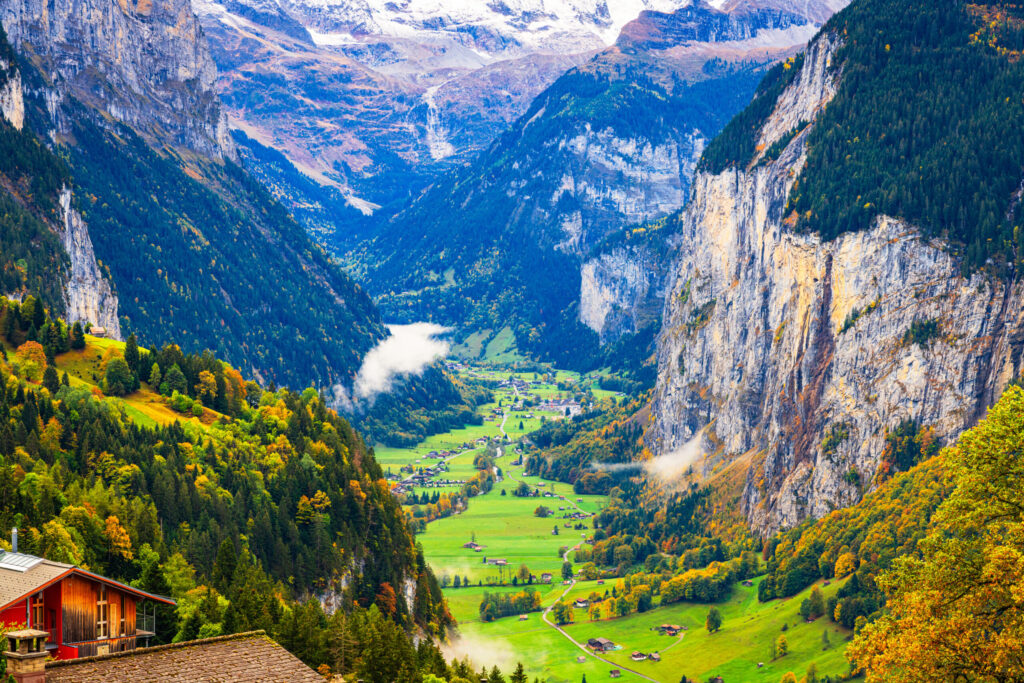 Lauterbrunnen, Switzerland valley from Wengen in the fall season with Staubbach Falls.