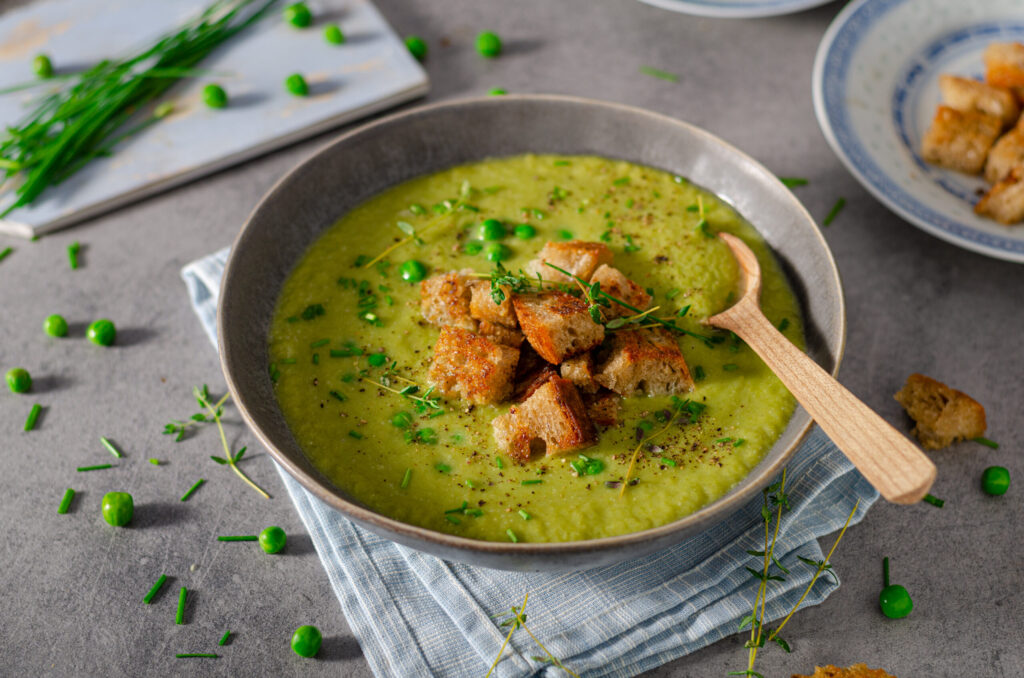Delicious leak soup with fresh bio peas and croutons
