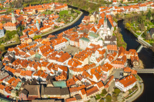 Panoramic view from above of amazing touristic old town Cesky Krumlov and river Vltava, Czech Republic.