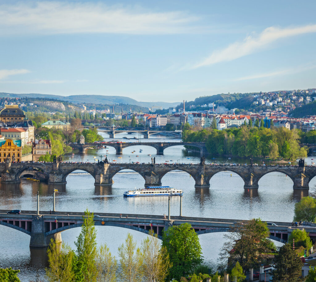 Travel Prague concept background - elevated view of bridges over Vltava river from Letna Park. Prague, Czech Republic