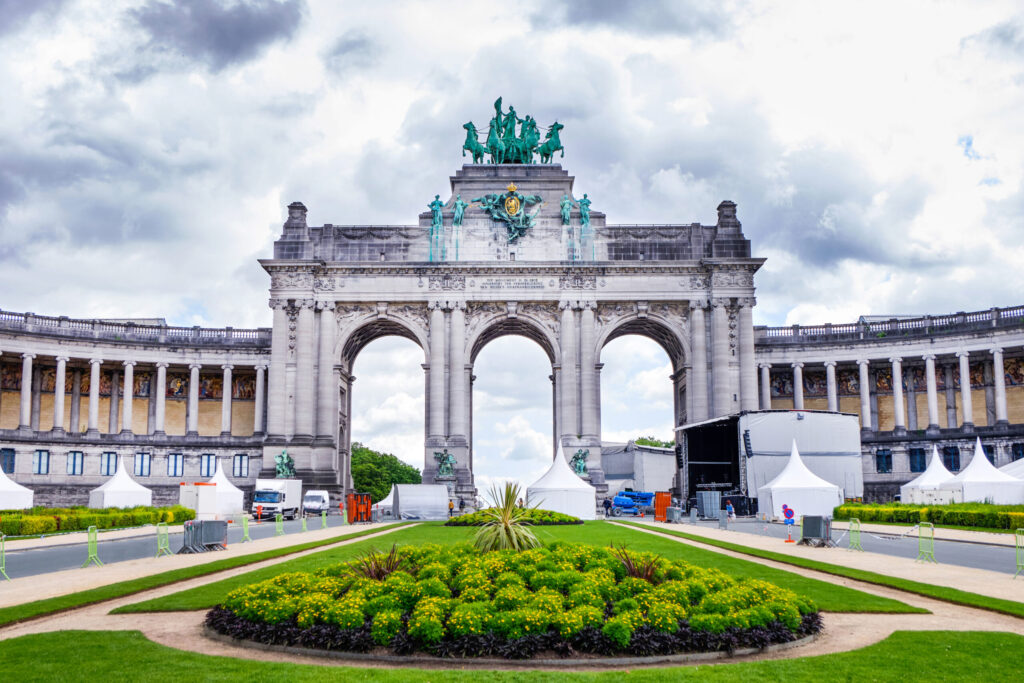 Parc du Cinquantenaire or Jubelpark in a cloudy day. Famous triumphal arch. Brussels, Belgium