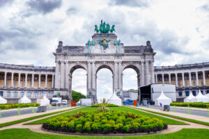 Parc du Cinquantenaire or Jubelpark in a cloudy day. Famous triumphal arch. Brussels, Belgium