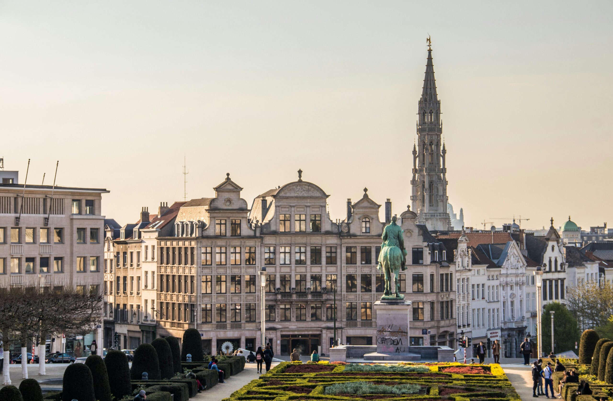 Historical urban charm in Belgium – elegant cityscape with Mont des Arts and medieval tower in Brussels, symbolizing architectural and cultural appeal when comparing living in Belgium vs Netherlands.