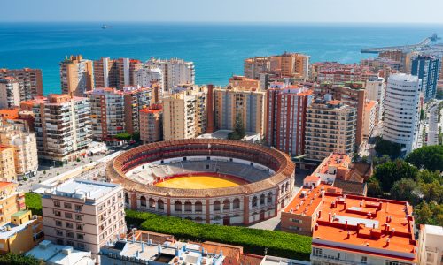 Malaga, Spain skyline towards the Mediterranean Sea in the afternoon.
